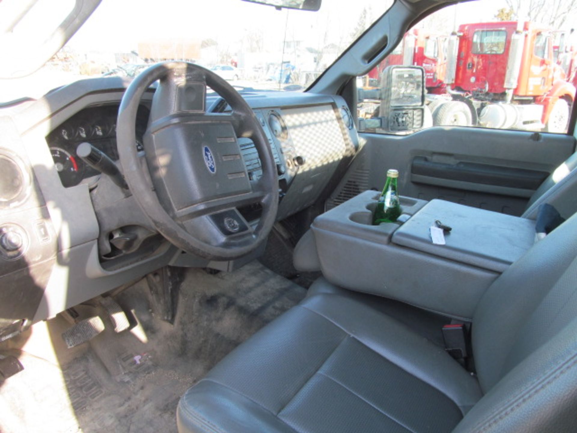 2012 Ford F450 Stakebed Truck with Lift Gate (VIN: 1FDUFGT0CEB54699) [Estimated Mileage: 105698. - Image 4 of 4