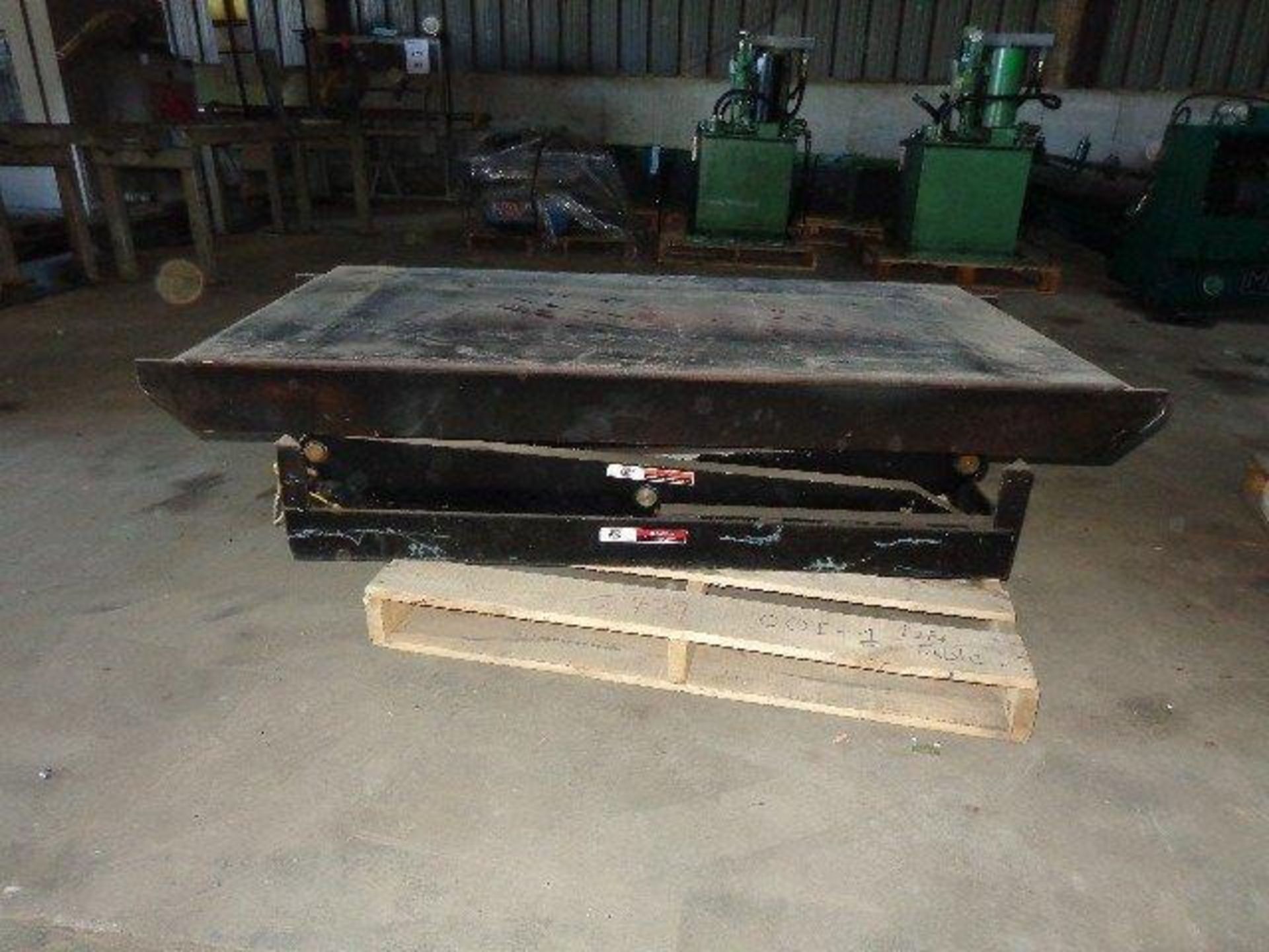 Advanced Lift Mdl. TSL 672 Lift Table. S/N 23285/1099Table Dimensions: 30" wide X 60" long Flat