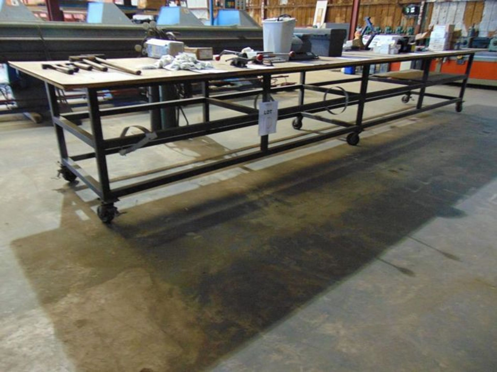 Working Table: Steel Frame W/Wood Top, Adjustable W/ Wheels, 48" X 19'9 1/4" X 38"H, Located At: