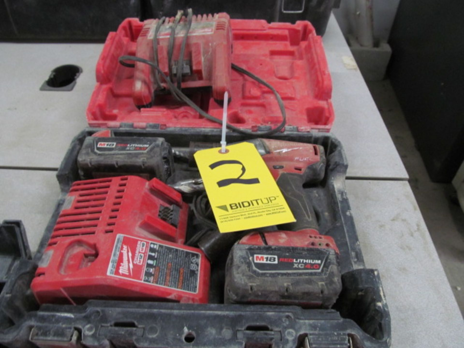 Milwaukee 1/2 18V Impact Wrench with charger, Located At: 305 Industrial Ln, Wheeling, IL 60090