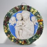 Early 20th Century Della Robbia type majolica roundel, of large proportions, with the Virgin Mary