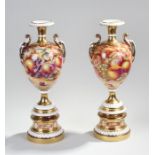 Fine pair of Royal Worcester porcelain vases, of large proportions, the first by P Stanley with