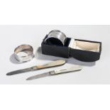 Silver items, to include two silver bladed fruit knives a cased silver napkin ring and another