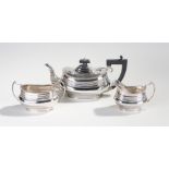 George V silver three piece tea service, Chester 1935, maker S. Blanckensee & Son Ltd, with a