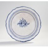 Early 19th Century creamware dish, with blue painted leaf border, blue circle and dot edge and