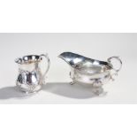 George VI silver sauce boat, London 1938, maker Edward Barnard & Sons Ltd, together with a silver