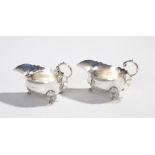 Pair of George V silver sauce boats, London 1927, maker Edward Barnard & Sons Ltd, with undulating