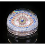 19th Century glass paper weight, the millefiori in whites, blues, oranges, reds and greens with a