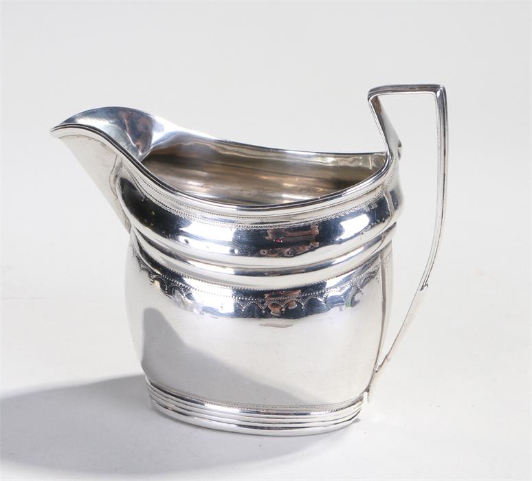 George III silver cream jug, London 1800, makers mark rubbed, the oval jug with a long spout and