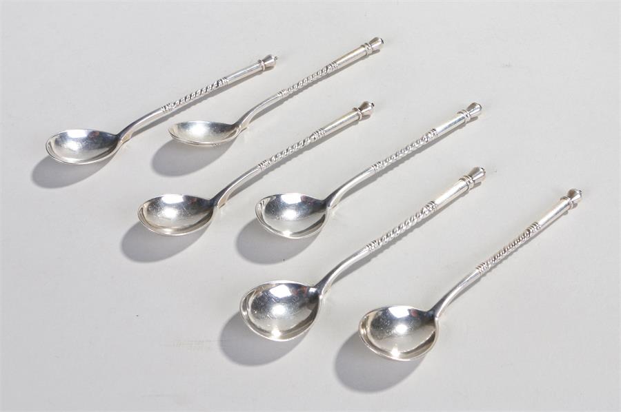 Set of six Russian silver spoons, the finial ends and twist shafts leading to the bowl with engraved