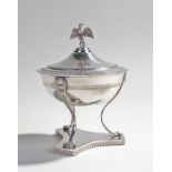 Italian silver lidded bonbon dish, stamped 800, the lid surmounted by an eagle above the lappet