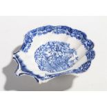 Early 19th century shell shaped pearlware butter dish, transfer decorated with willow pattern,