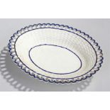 Circa 1810 Pearlware dish in the form of a basket, with basket weave sides, pierced rim decorated in