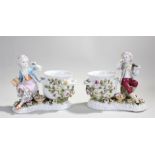 Pair of Meissen style porcelain vases, with a pair of large cauldron bowls with trailing flowers,