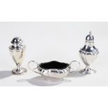 Silver objects, to include a bun pepper, London 1934, silver salt with fluted body and blue glass