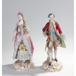 Pair of porcelain Dresden figures, of a gentleman and a lady in 18th Century dress, 33cm high