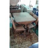 Early 20th Century oak draw leaf table, raised in turned supports, together with a set of four oak