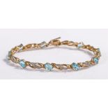 9 carat gold bracelet, with pale blue stones, 7.2 grams