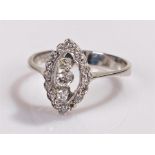 Diamond set ring, the head in a naiveté form set with round cut diamonds, ring size M