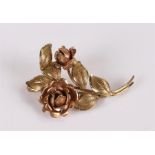 9 carat gold flower brooch, with flower and leaf design, 5 grams