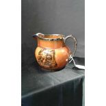 Ridgways Treacle ware jug illustrating a scene from Dickens' The Pickwick Papers, 14cm high