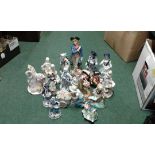 Mixed ceramic figurines to include a Staffordshire hand painted Long John Silver Toby jug and