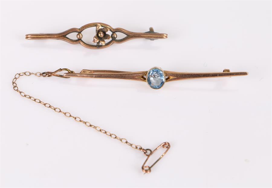 Two 9 carat gold brooches, one set with a blue stone (AF) the other in AF condition also, total