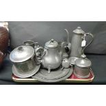 Collection of pewter to include a glass bottomed tankard, a tea and coffee pot and candle holder (