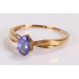 9 carat gold ring, with a blue stone set the centre, ring size T