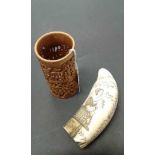 Resin cast scrimshaw whales tooth replica together with a resin wood effect brush pot (2)