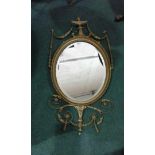 19th Century gilt gesso mirror, oval form with gilt swags