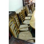 Set of six oak ladder back chairs, to include two carvers and four singles, (6)