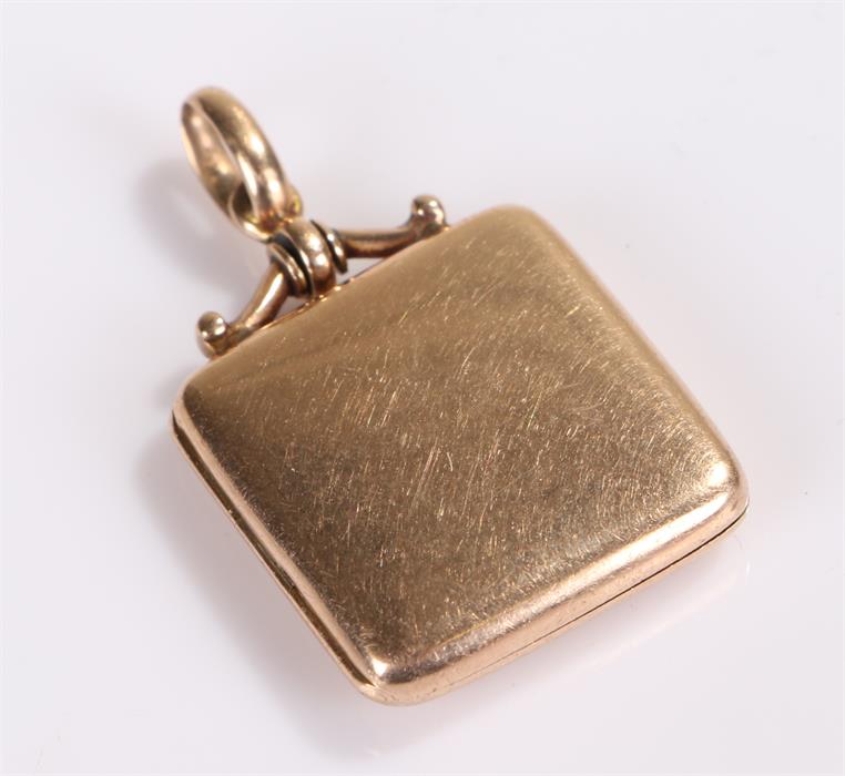 10 carat gold locket, hinged square locket, 7.6 grams