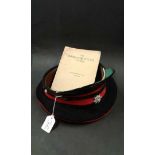 British Army service dress cap badged to the Royal Anglian Regiment, together with The Book for