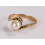 9 carat gold pearl set ring, with a cross over design