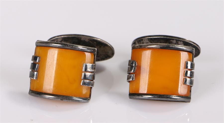 Pair of silver and Bakelite amber cufflinks, Art Deco design