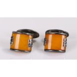 Pair of silver and Bakelite amber cufflinks, Art Deco design