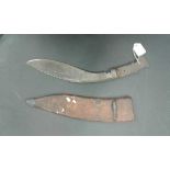 An interesting British Indian Army Mark II military Kukri with leather scabbard , the blade is