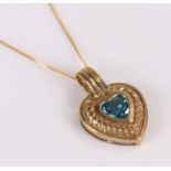 9 carat gold blue topaz set heart pendant, the pendant 16mm diameter