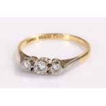 18 carat gold diamond set ring, set with three round cut diamonds to the head, ring size N