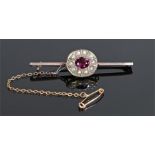 Pearl and tourmaline brooch, the central oval tourmaline with pearl surround to the bar brooch, 52mm