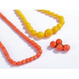 Coral necklace, together with buttons and a yellow bead necklace