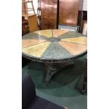 Faux marble effect breakfast table the circular top with painted sections above the turned base,