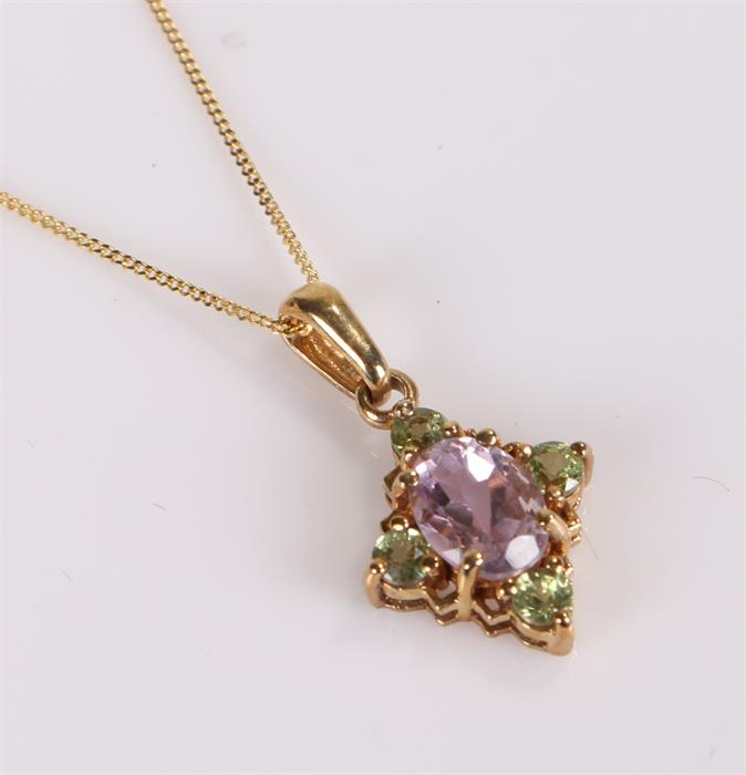 9 carat gold multi stone set pendant necklace, the pendant 12mm diameter