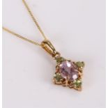 9 carat gold multi stone set pendant necklace, the pendant 12mm diameter