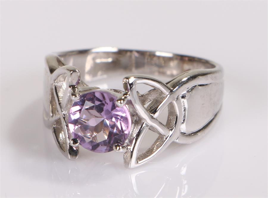 9 carat gold ring, with central purple stone, ring size O