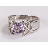 9 carat gold ring, with central purple stone, ring size O