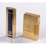 Givenchy gold plated and enamel lighter, with a blue band of enamel to either side, together with