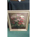 A framed oil painting of flowers in a vase by Alfred Coe, 39 cm x 50 cm