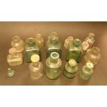 Fourteen late 19th Century Ink Bottles to include three Field's Ink and Gum green glass bottles.